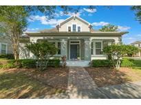 Charming single-story home with a well-manicured front yard and inviting entrance, creating great curb appeal at 3223 Blazing Star Ln, Harmony, FL 34773