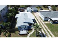 Charming single-Gathering home featuring a cozy front porch and well-maintained landscaping, perfect for coastal living at 488 Golf Blvd, Daytona Beach, FL 32118