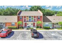 Charming townhome featuring colorful accents, landscaping and convenient parking at 4952 Tangerine Ave # 4952, Winter Park, FL 32792