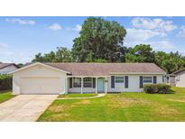 Charming single story home with a well-manicured lawn, attached garage and pleasing curb appeal at 620 Marshall St, Altamonte Springs, FL 32701