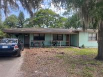 Charming one-story home with ample front yard and mature trees at 6251 Bolling Dr, Orlando, FL 32808