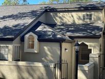 Charming townhouse featuring a classic design and architectural details at 1486 Farrindon Cir, Lake Mary, FL 32746