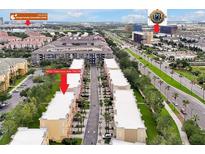 Aerial view of a community featuring townhomes with easy access to main thoroughfares and local attractions at 4816 Tidecrest Ave # 178, Orlando, FL 32819