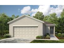 Charming single-story home featuring a large two-car garage and neutral color palette at 483 Wayland Dr, Haines City, FL 33844