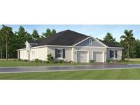 Charming single-story home featuring a symmetrical facade, two-car garage, and beautifully landscaped front yard at 4343 Curacao Pl, Kissimmee, FL 34758