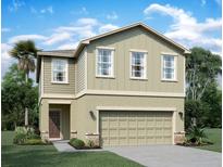 Charming two-story home with neutral siding, attached two-car garage, and well-maintained landscaping at 1397 Dalkeith Cv, Sanford, FL 32771