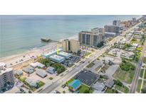 Aerial view of a beachfront condo complex with easy access to the beach, pier, and main street at 3641 S Atlantic Ave # 110, Daytona Beach, FL 32118