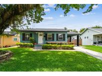Charming single story home with a well manicured lawn and cozy curb appeal at 536 W King St, Orlando, FL 32804