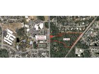 Aerial view of the 15 acre property near Lake Mary High School, perfect for development or private estate at 680 Longwood Lake Mary Rd, Lake Mary, FL 32746