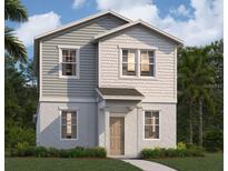 Charming two-story home featuring lap siding, shingle siding, a welcoming front porch, and manicured landscaping at 5626 Stockade Blvd, St Cloud, FL 34771