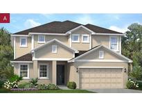 Two-story home featuring a two-car garage, neutral-colored siding, a gray roof, and a well-manicured lawn at 2261 Sirena Ln, Mount Dora, FL 32757