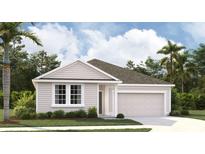 Charming single-story home featuring a well-manicured lawn and attached garage at 2379 Broadbrook Drive, St Cloud, FL 34771