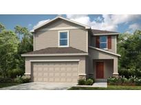 Charming two-story home featuring a neutral color palette and an attached two car garage at 661 Teviot Rd, Haines City, FL 33844