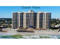 A beachfront building with a beautiful architecture on a sunny day near the beach with ocean waves at 1925 S Atlantic Ave # 411, Daytona Beach, FL 32118