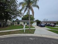 Charming single-story home featuring a well-manicured lawn and inviting curb appeal at 4123 Gander Ave, Orlando, FL 32822
