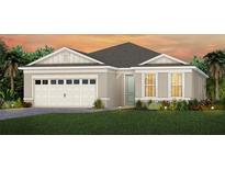 Charming single-story home featuring a two-car garage, neutral paint, and well-manicured lawn at 2757 Redblush Ter, St Cloud, FL 34772