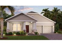 Charming single-Gathering home featuring a welcoming front porch, a two-car garage, and well-maintained landscaping at 1852 Clear Sky Dr, Kissimmee, FL 34744