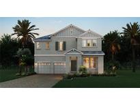 Charming two-story home features a two-car garage and well-manicured landscaping at 11027 Hollow Bay Dr, Winter Garden, FL 34787