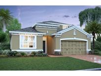 Charming single-story home with a well-manicured lawn, two-car garage, and neutral-colored stucco facade at 813 River Stone Trl, Sanford, FL 32771