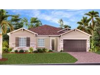 Charming single-story home with a manicured lawn, stone accents, and a two-car garage at 2927 Believe In Yourself Ct, Clermont, FL 34714