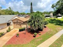 Charming single-story home with well-maintained landscaping and a cozy front yard at 2922 Burlington Dr, Apopka, FL 32703