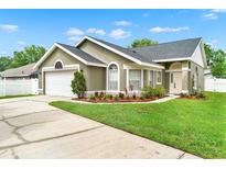 Charming single-story home features a well-maintained lawn and inviting curb appeal at 1706 Terra Cota Ct, Orlando, FL 32825