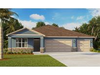 Charming single-story home featuring a two-car garage, stone accents, and a well-maintained lawn at 1364 Morning Walk Dr, Ormond Beach, FL 32174