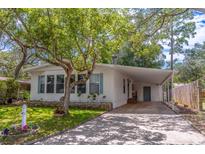 Charming single-story home with a covered carport and well-maintained front yard at 116 E Plantation Blvd, Lake Mary, FL 32746