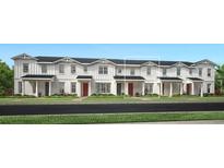 Charming row of new townhomes with HardiePlank siding and covered porches at 1862 Falconhurst Ln, Apopka, FL 32703