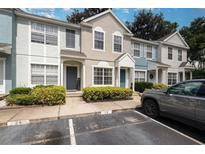 Charming townhome with well-manicured landscaping and a designated parking spot at 1178 Vineland Pl, Lake Mary, FL 32746