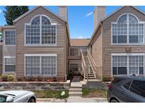Inviting two-story townhouse with well-kept landscaping and easy stair access at 685 Youngstown Pkwy # 300, Altamonte Springs, FL 32714