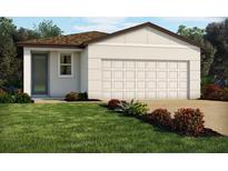 Charming single-story home featuring a two-car garage and a well-manicured lawn with colorful landscaping at 3678 Portsmouth Ln, Haines City, FL 33844