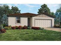 Charming single-story home with a well-manicured lawn and an attached two-car garage at 1345 Oak Valley Dr, Auburndale, FL 33823
