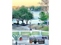 Beautiful view of the lake and park from the unit's balcony, perfect for enjoying the outdoors at 151 E Washington St # 508, Orlando, FL 32801