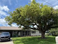 Charming single story home with a large tree offering plenty of shade and curb appeal at 2648 Amsden Rd, Winter Park, FL 32792