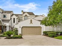 Charming home featuring a two-car garage, well-maintained landscaping, and neutral color palette at 3966 Villas Green, Longwood, FL 32779