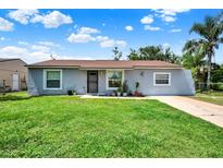 Charming single-story home with a well-maintained lawn and inviting curb appeal at 7807 Pine Hawk Ln, Orlando, FL 32822