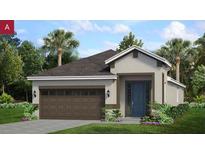 Charming single-story home with a two-car garage and beautifully landscaped front yard at 1198 Atlantic Ave, Fruitland Park, FL 34731