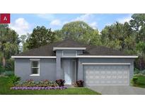 Charming single-story home with well-manicured lawn and an attached two-car garage in a quiet neighborhood at 778 Lemon Ave, Fruitland Park, FL 34731