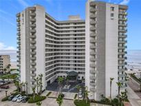 Expansive views from this high-rise condo with private balconies, lush landscaping, and plenty of parking at 2055 S Atlantic Ave # 1410, Daytona Beach Shores, FL 32118