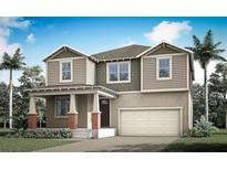 Charming two-story home with a welcoming front porch, attached two car garage, and lush landscaping at 466 Free Range Dr, Clermont, FL 34715