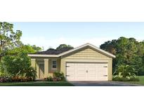 Charming single-story home featuring a two-car garage, neutral-colored facade, and a beautifully landscaped front yard at 2816 Swooping Sparrow Dr, St Cloud, FL 34773