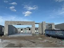 New home's concrete block framework showcases the property's structure, revealing its future layout and potential at 821 River Stone Trl, Sanford, FL 32771