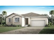 Charming single-story home featuring a two-car garage, landscaped yard, and a neutral color palette at 336 Free Range Dr, Clermont, FL 34715