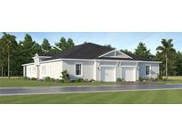 Charming single-story home with a well-maintained lawn, two-car garage, and inviting curb appeal at 4335 Curacao Pl, Kissimmee, FL 34758