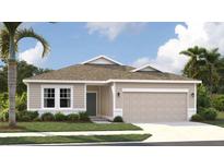 Charming single-story home featuring a two-car garage and a beautifully landscaped front yard with tropical trees at 2292 Broadbrook Drive, St Cloud, FL 34771