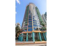 Modern high-rise building features large windows, balconies, and unique architectural details at 322 E Central Blvd # 1412, Orlando, FL 32801
