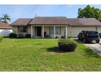 Charming single-story home with a well-maintained lawn, and a brick exterior at 1152 Ring St, Deltona, FL 32725