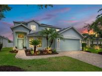 Charming two-story home with landscaped yard and a two-car garage at 912 Pickfair Ter, Lake Mary, FL 32746