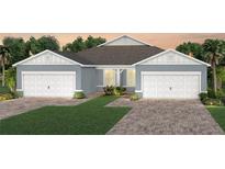 Charming single-Gathering home with a two-car garage, attractive landscaping, and a modern design at 2348 Daisy Tree Rd, St Cloud, FL 34771